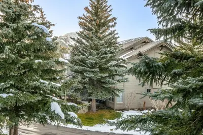 a house with a christmas tree in the yard at Snowcreek V 870 in Mammoth Lakes