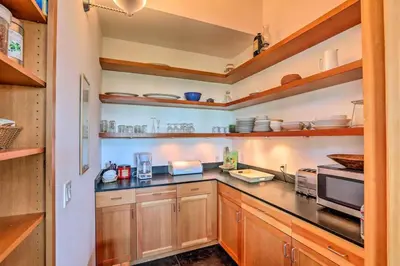 a large kitchen with wooden cabinets and counters at A Quiet Escape in Truckee