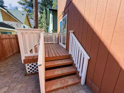 a wooden staircase leading up to a house at Charming Lake Tahoe Getaway 30 Plus Days Bookings Only Accepted in Zephyr Cove