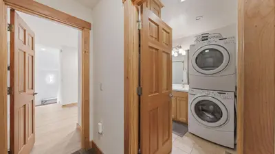 a laundry room with a washer and dryer at Near Ski Resorts Downtown Truckee Donner Lake Basque Lodge by AvantStay in Truckee