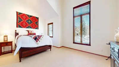 a bedroom with a bed and a window at Snowcreek V #819 condo in Mammoth Lakes