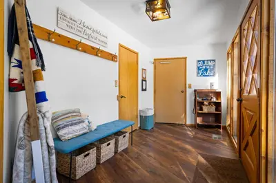 a hallway with a bench in a room at Nana & Papas-Family Friendly in East Village in Shaver Lake