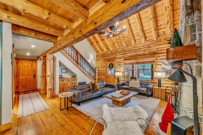 a living room filled with furniture and a wooden ceiling at Lake Tahoe Haven Private Hot Tub Deck in Tahoma