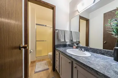 a bathroom with a sink and a mirror at Kingswood Pines in Kings Beach