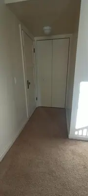 an empty room with a closet and a door at Historic Reno Home in Reno