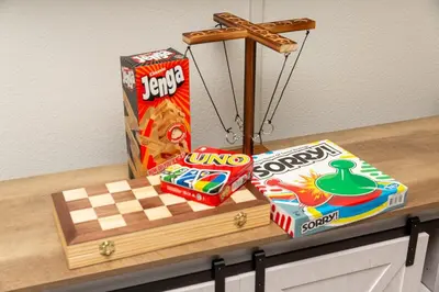a wooden table with snacks and a chess board at New Modern 3bed in North Merced 5 Star hosts in Merced
