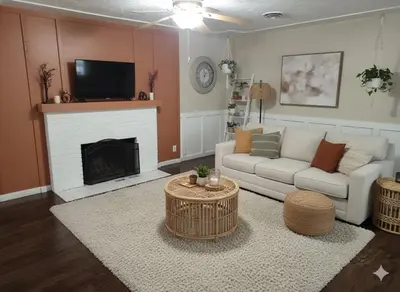 a living room with a couch and a fireplace at 3BR 2B Boho Retreat with meditation room in Modesto