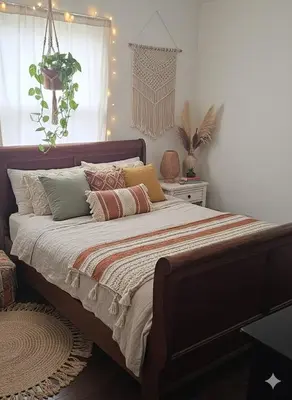 a bedroom with a large bed with pillows at 3BR 2B Boho Retreat with meditation room in Modesto