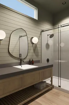 a bathroom with a sink and a mirror and a shower at Outbound Yosemite in Oakhurst