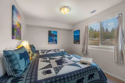a bedroom with two beds and a window at Lookout Point - Retreat for 6 in South Lake Tahoe