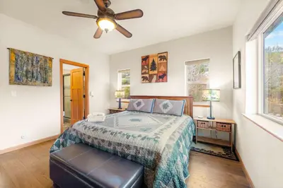 a bedroom with a bed and a ceiling fan at Lookout Point - Retreat for 6 in South Lake Tahoe