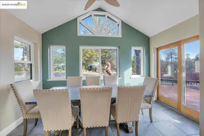 a dining room with a table and chairs at 7 br Mega home near Yosemite Spacious, Game Room in Groveland