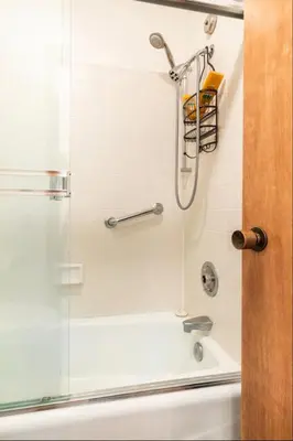 a shower in a bathroom with a tub at Snowcreek 290 in Mammoth Lakes