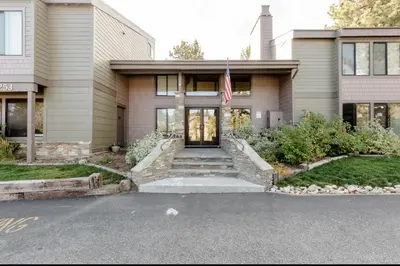 a house with an american flag in front of it at Summit 33 in Mammoth Lakes