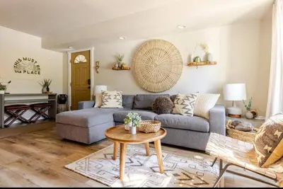 a living room with a couch and a table at Seasons Four 165 in Mammoth Lakes