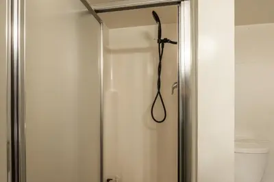 a shower with a shower head in a bathroom at Sierra Park Villas 17 in Mammoth Lakes