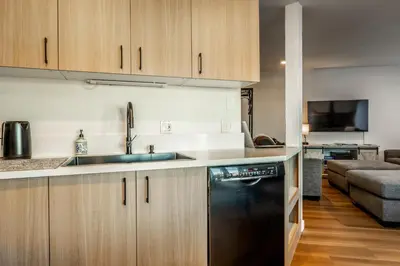 a kitchen with a sink and a dishwasher at Sierra Park Villas 17 in Mammoth Lakes