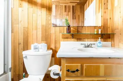 a bathroom with a toilet and a sink at Mammoth View Villas 32 in Mammoth Lakes
