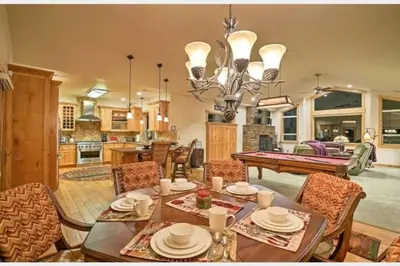 a dining room and kitchen with a table and a pool table at The Salty Pine - Pool Table, Small Dogs, 4 Bedrms in South Lake Tahoe