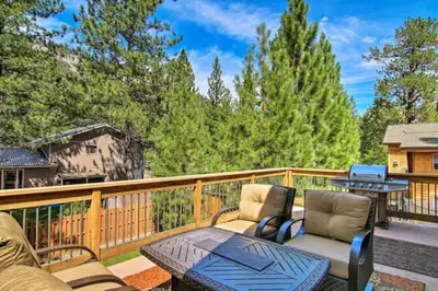 a patio with two chairs and a table on a deck at The Salty Pine - Pool Table, Small Dogs, 4 Bedrms in South Lake Tahoe
