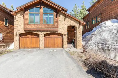 a house with a garage and a driveway at Stonegate 12 in Mammoth Lakes