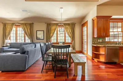 a living room with a couch and a table at Magnolia Lodge 1 in Mammoth Lakes