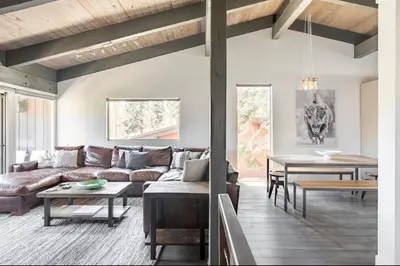 a living room with a couch and a table at Mammoth Estates 233 in Mammoth Lakes