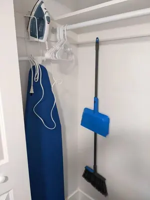 a room with two broomsticks at 719 Mid-Town Retreat in Reno