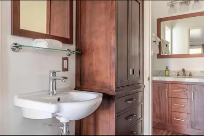 a bathroom with a sink and a mirror at Chateau Blanc 21 in Mammoth Lakes