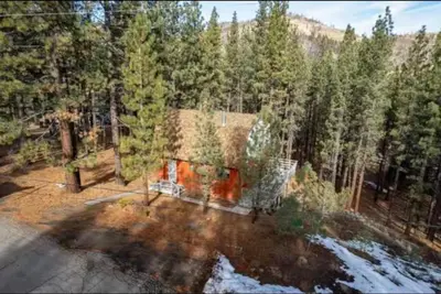 an aerial view of a house in the woods at Cozy Room in Rural Markleeville Cabin in Markleeville