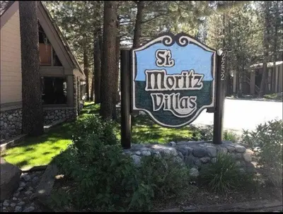 a sign for a motel in front of a building at St. Moritz 39 in Mammoth Lakes
