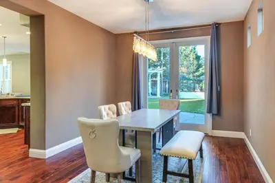 a dining room with a table and chairs at Near Wineries and Parks Waterfront Tracy Getaway! in Tracy