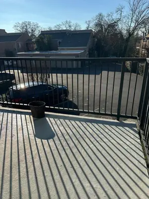 a balcony with a fence and a bench at The gorgeous in Citrus Heights