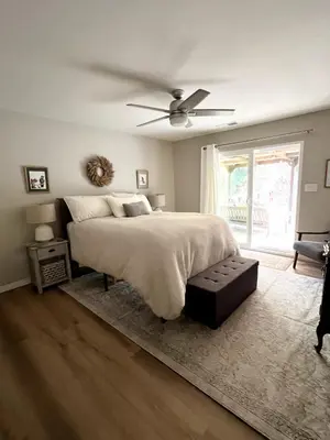 a bedroom with a bed and a ceiling fan at River Retreat near Sequoia National Park in Three Rivers
