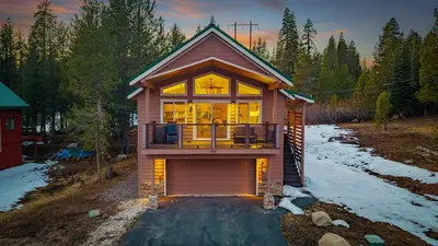 a house with a large window on the front of it at Mountain Retreat - Sleeps 7 - Canoe - Fireplace in Soda Springs