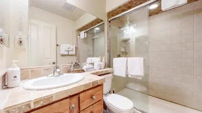 a bathroom with a sink and a toilet and a shower at Timberline #08 condo in Mammoth Lakes