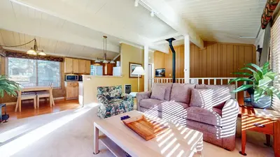 a living room with a couch and a table at Timberline #08 condo in Mammoth Lakes