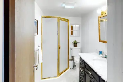 a bathroom with a mirror and a sink and a toilet at Yosemite Escape in White Wolf