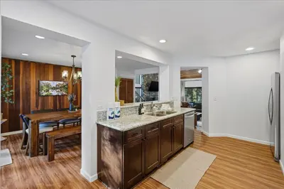 a kitchen with a counter and a dining room at Yosemite Spirit in White Wolf