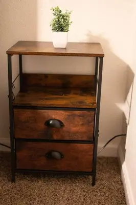 a wooden table with a potted plant on top of it at Kipps Hill Haven B — Folsom Lake Escape in El Dorado Hills