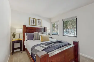 a bedroom with a large bed and a window at Spectacular Lake Views in Tahoe City