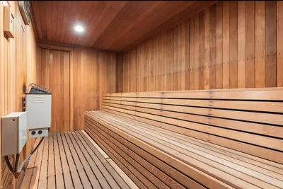 a sauna with wood paneled walls and aperature at Winterset 4 in Mammoth Lakes
