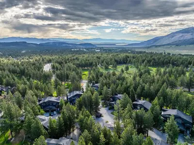 an aerial view of a resort surrounded by trees at Timbers 1057 in Mammoth Lakes