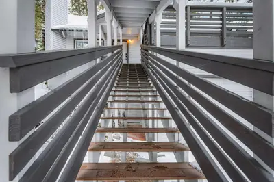 a staircase leading up to a house at Zephyr Chalet Steps from Zephyr Cove in Glenbrook