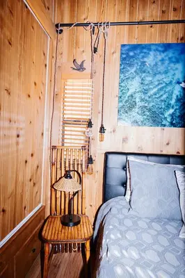 a bedroom with a bed and a side table at Near Ski, Beaches, Pet Friendly, Full kitchen in South Lake Tahoe