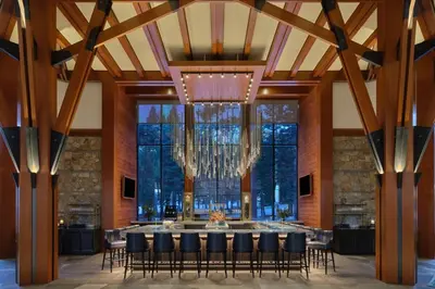 a large dining room with a table and chairs at Ritz-Carlton Northstar Luxury Ski-In Ski-Out in Truckee