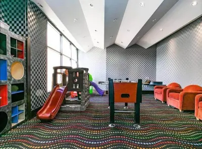a childrens play room with a slide and a playground at 3BR Condo in Village at Palisades - Premier in Olympic Valley