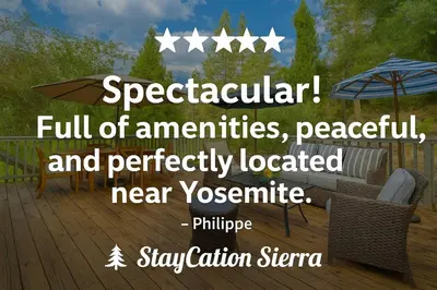a picture of a deck with an umbrella and chairs at StayCation Sierra – Nonpareil Retreat in Groveland
