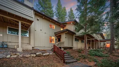 a house with a staircase in front of it at Les Roes by AvantStay Incline Village Retreat • Near Lake Tahoe Beaches and Scenic Trails Diamond Peak and Local Hot Spots in Incline Village
