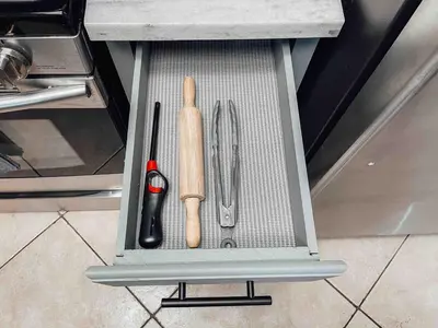 a drawer with kitchen utensils in a cabinet at Cozy 2 bedroom 2 baths home in North Highlands